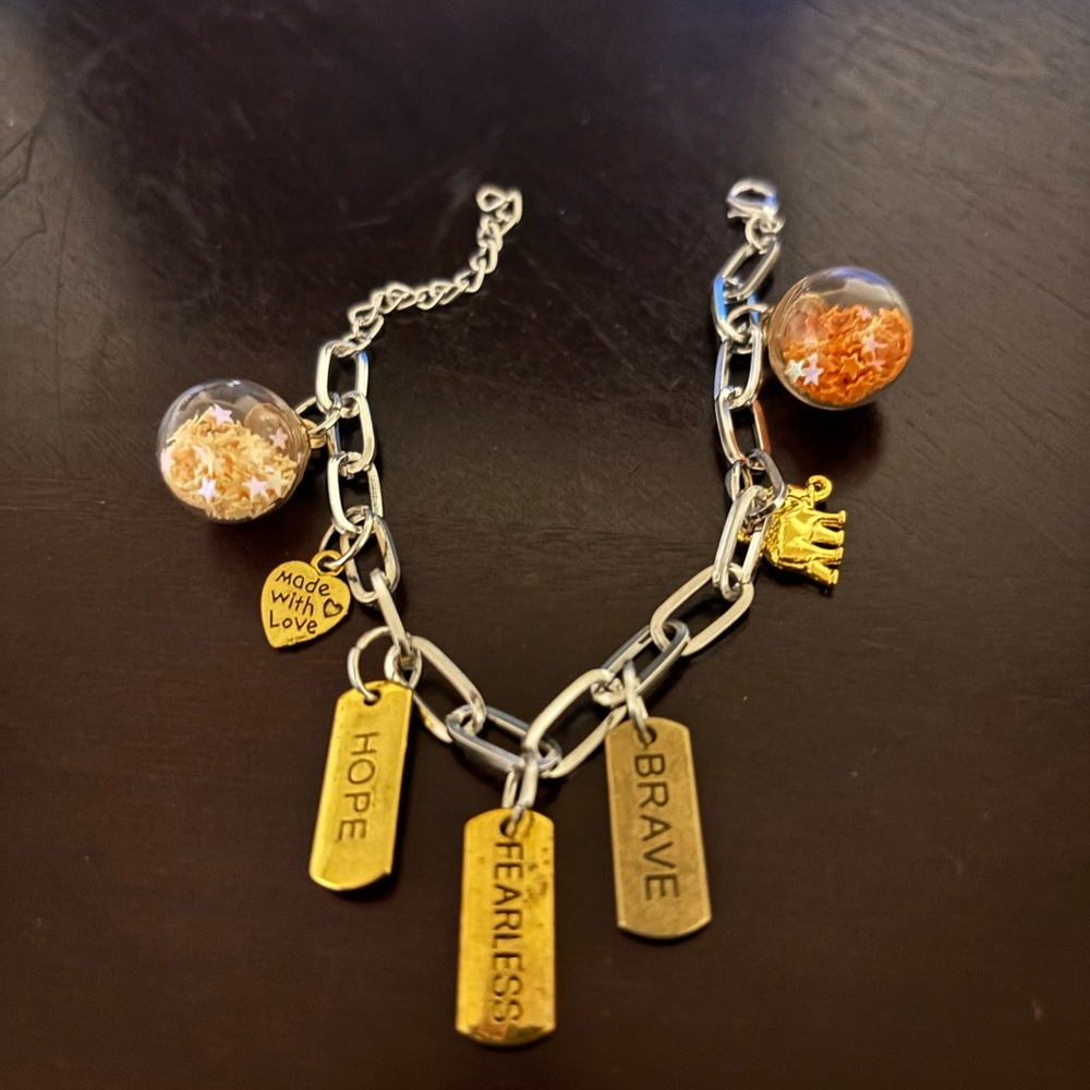 Charming Silver Bracelet with Gold Accents